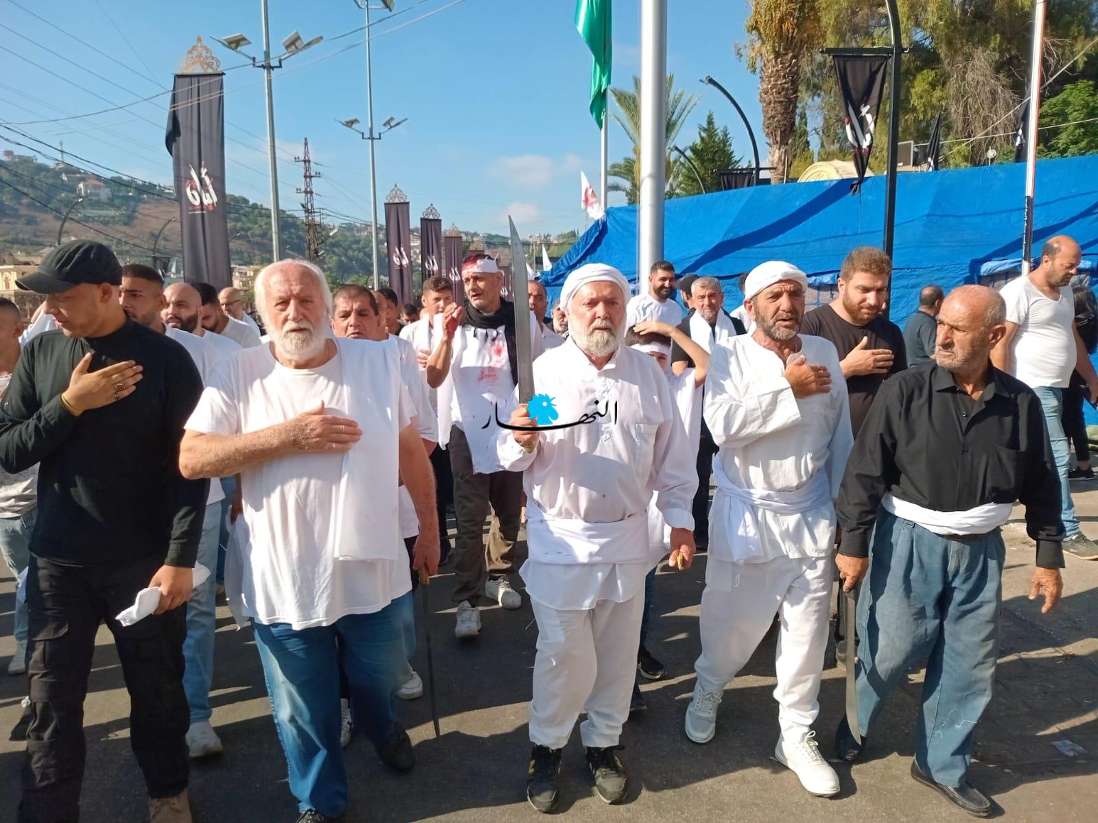 إحياء ذكرى عاشوراء في النبطية... تطبير وعدم تمثيل واقعة مصرع الإمام الحسين كما جرت العادة كل عام (صور)